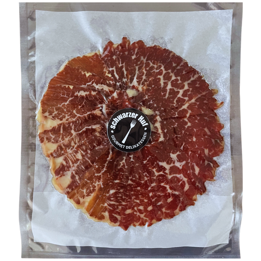 Handgeschnittene Cecina de León, luftgetrocknetes und mild über Akazienholz geräuchertes Rindfleisch, 90 g vakuumverpackt